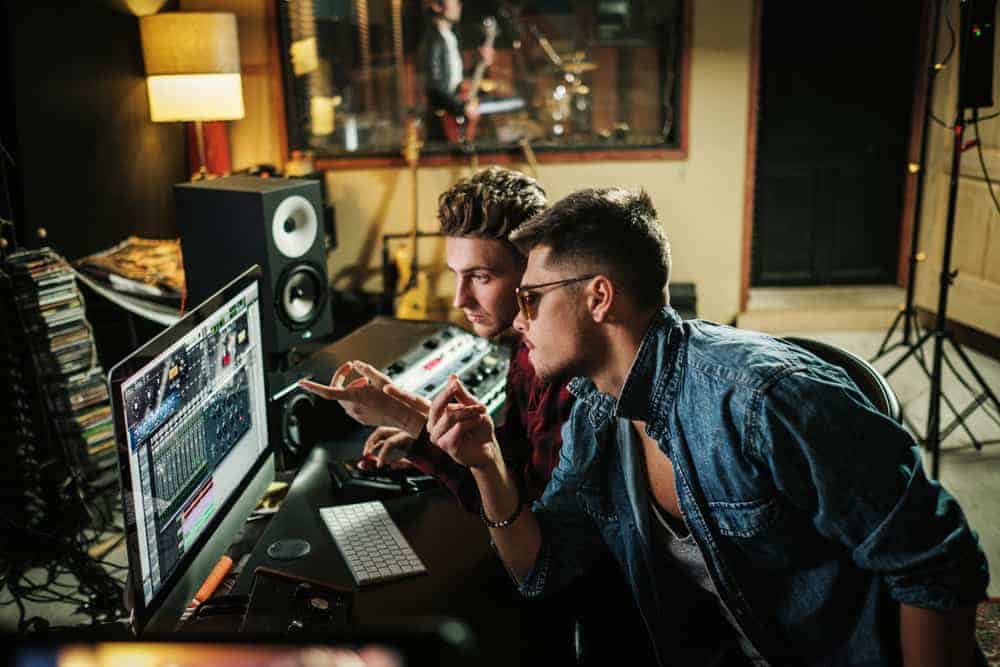 Record Producers working in a music studio