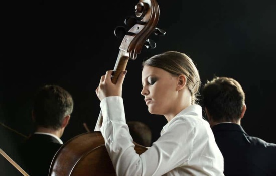 Section Leader of the cellos performing in orchestra