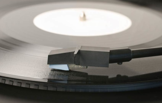 Vinyl record and record player stylus
