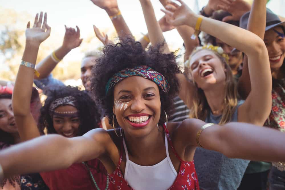 Young women enjoying a music festival