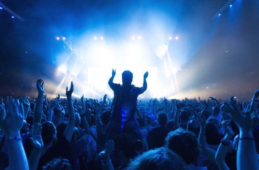 Large crowd in front of the stage at a music festival