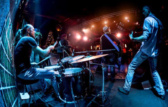 Band performing on concert stage