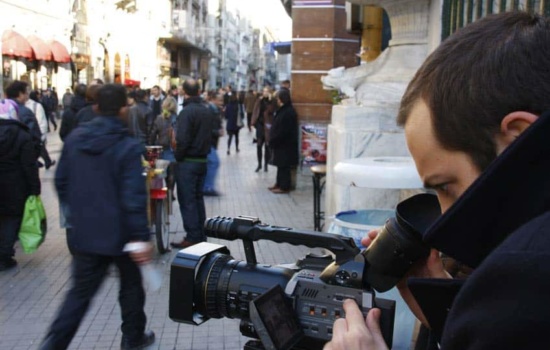Music Video Director shooting a scene outdoors