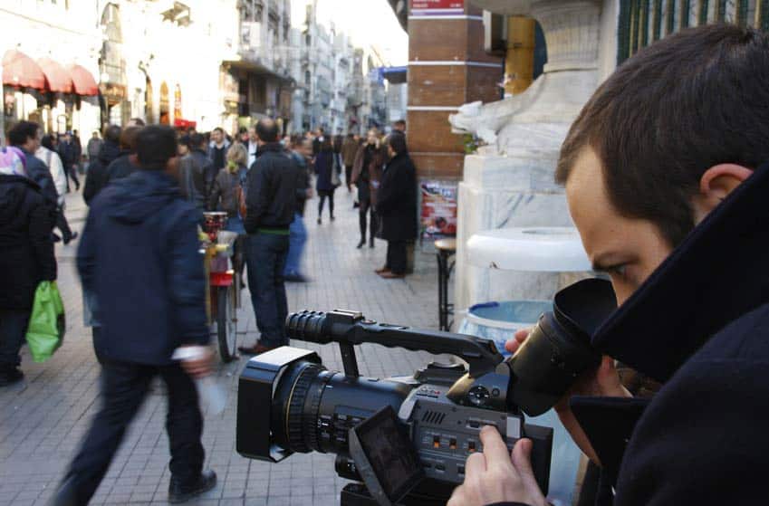 Music Video Director shooting a scene outdoors