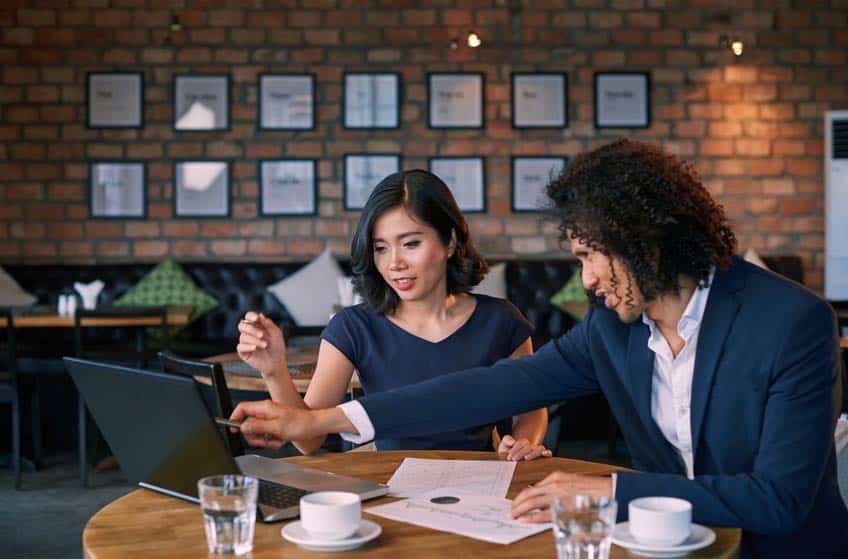 Music attorneys discussing a case on lunch break at a restaurant