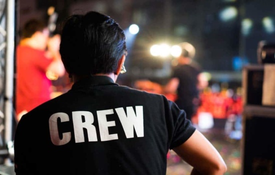 Roadie watching the band from backstage