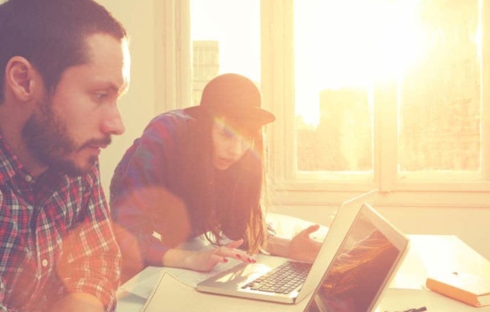 Music manager and client with laptop