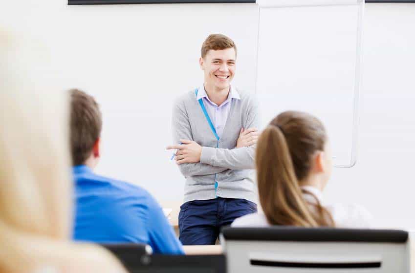 Musicologist at front of the classroom teaching college students