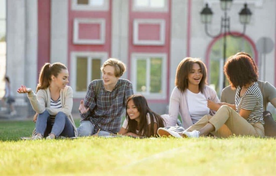 Music masters level students on campus lawn