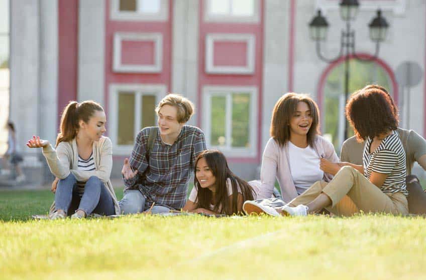 Music masters level students on campus lawn