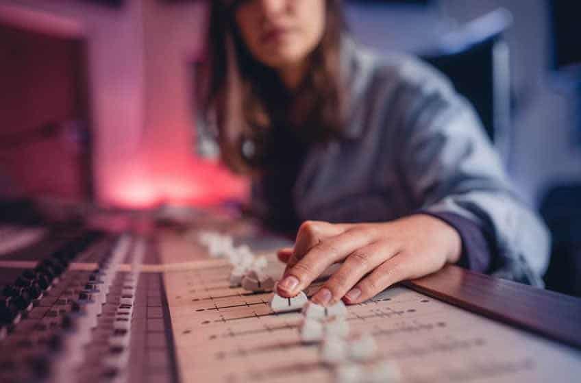 Female student in sound engineering course