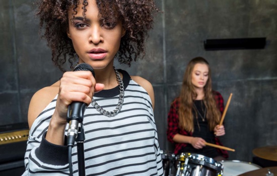 Female Singer and Drummer in Studio