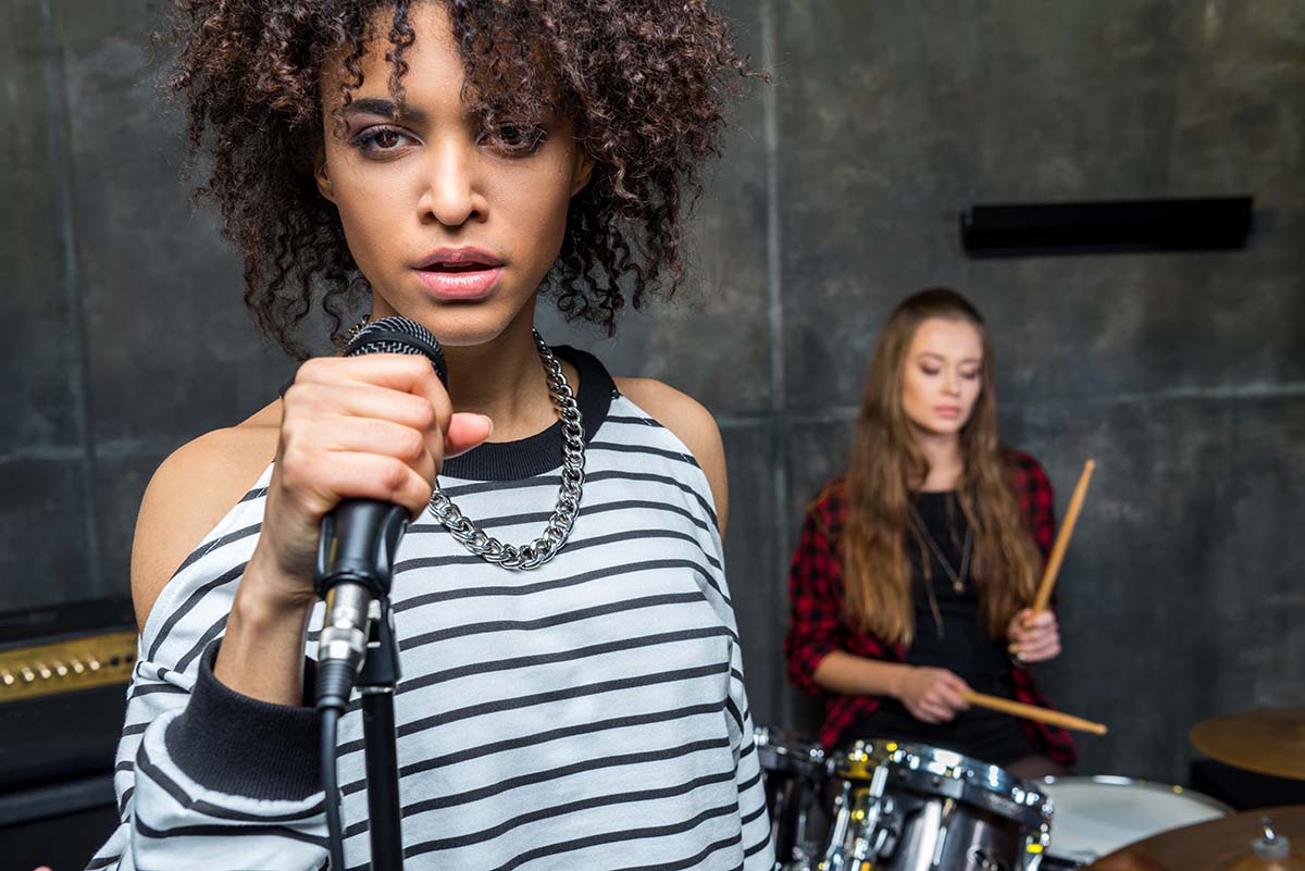 Female Singer and Drummer in Studio