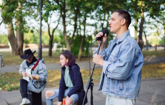 Band using portable sound system outdoors