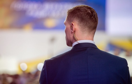Celebrity Bodyguard surveying the crowd at a music awards show
