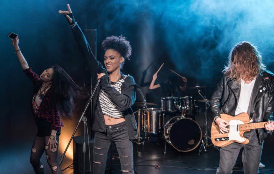 Rock Star on stage with her band