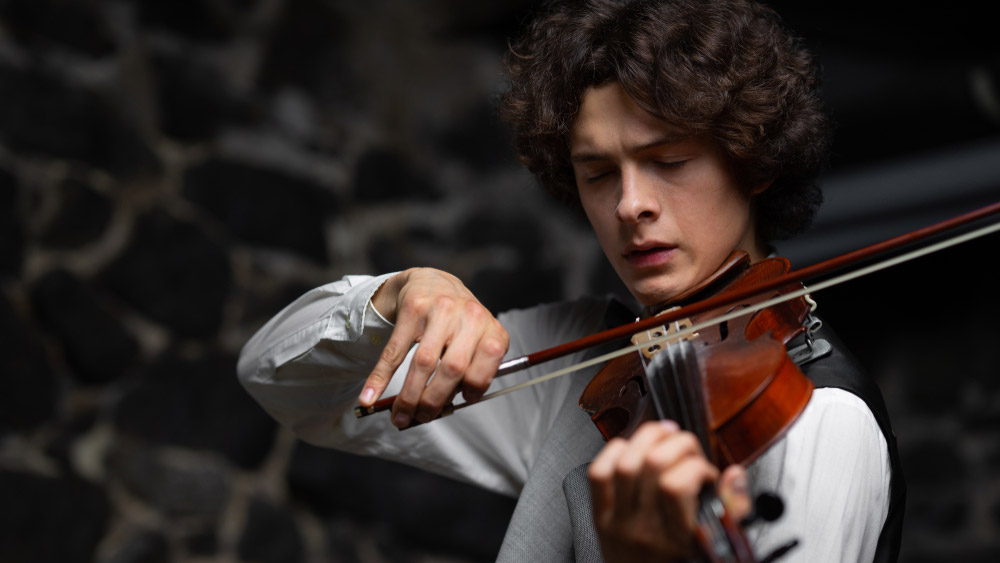 Concertmaster playing his violin