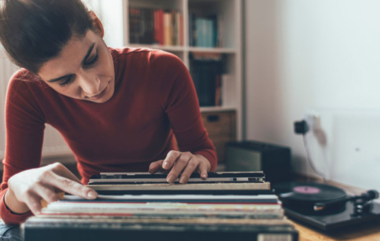 Woman looking through her vinyl records