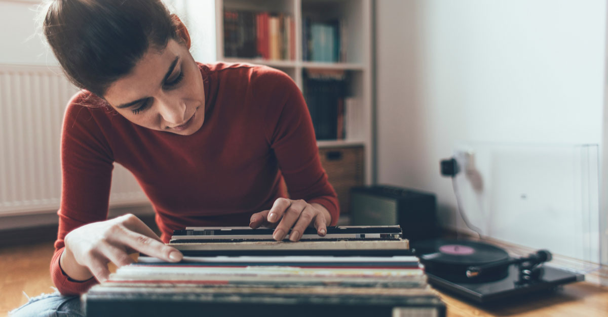 Woman looking through her vinyl records