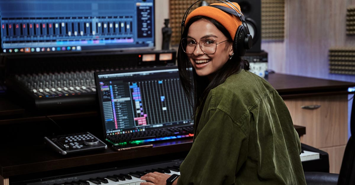 Female Sound Designer in production studio