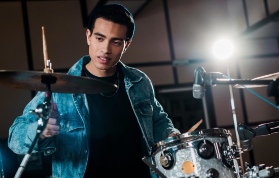 how to write good lyrics for a song Young Black male Drummer playing the drums