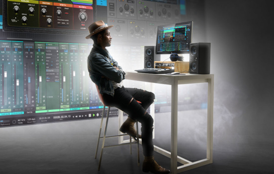 A music producer sits in his studio.