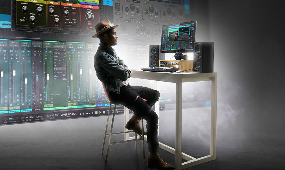 A music producer sits in his studio.