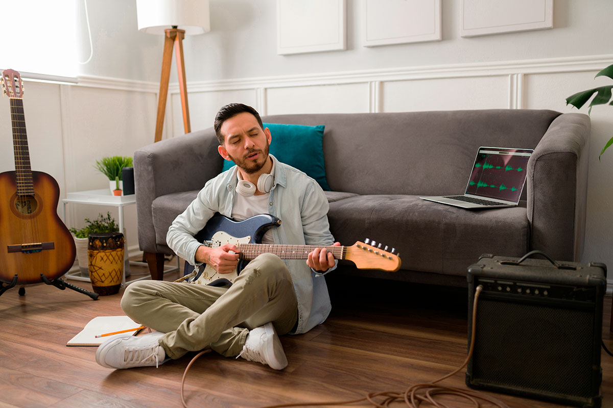 talented man making a song at home