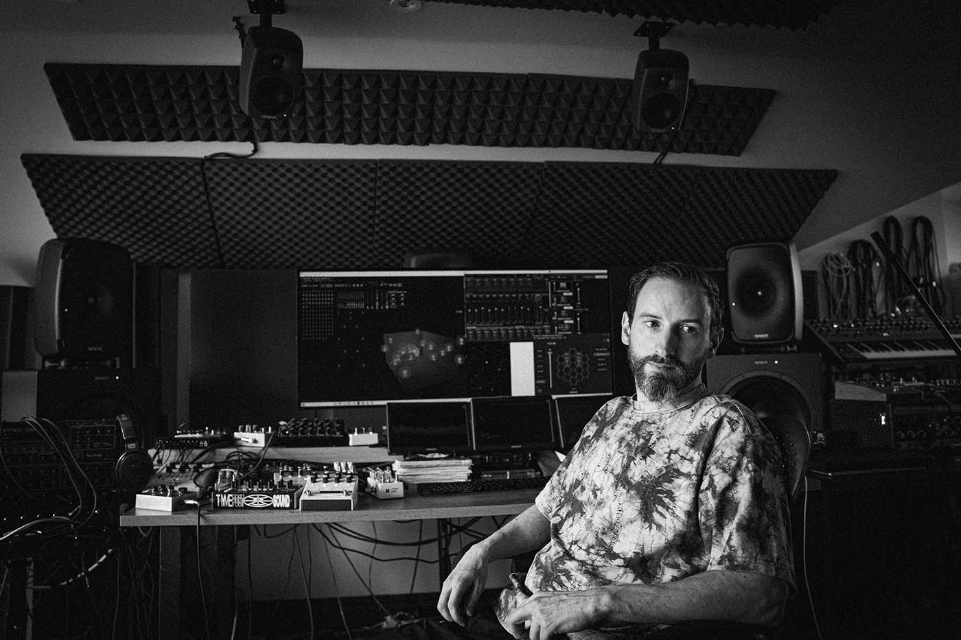 Ableton Live running on a computer screen sitting in a studio environment